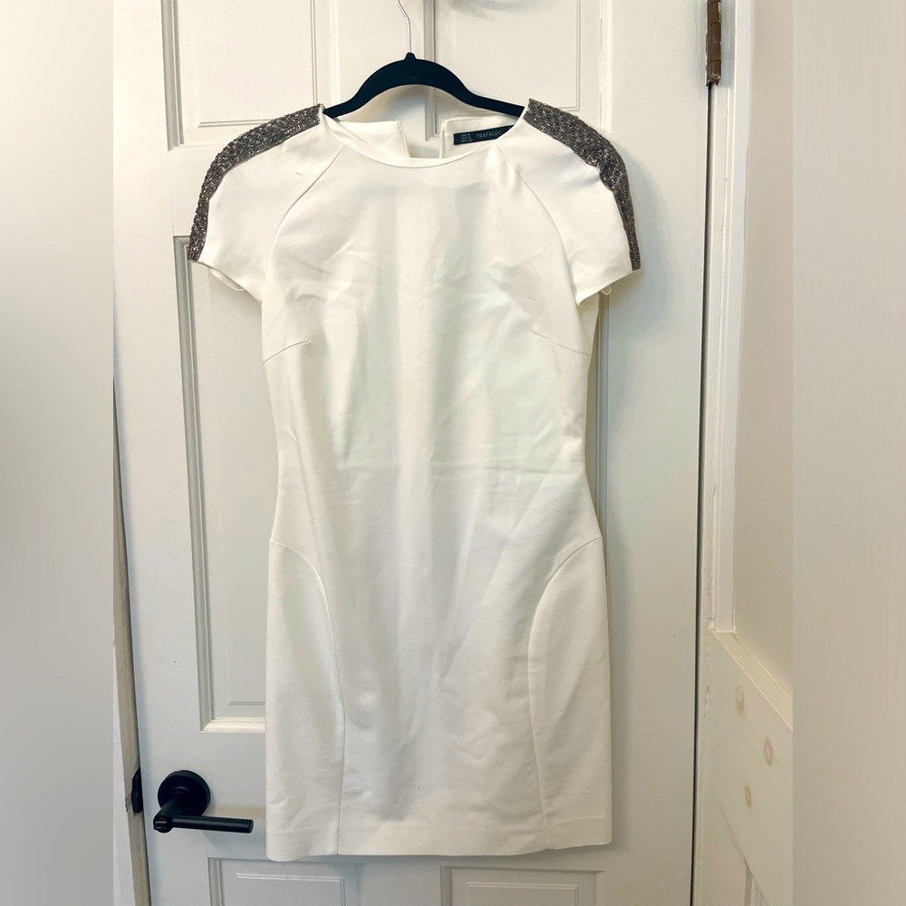 White Zara bodycon dress. Beaded detail on the shoulders, size M